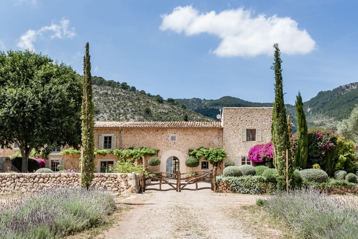 Restored Catalan masia with mountain views